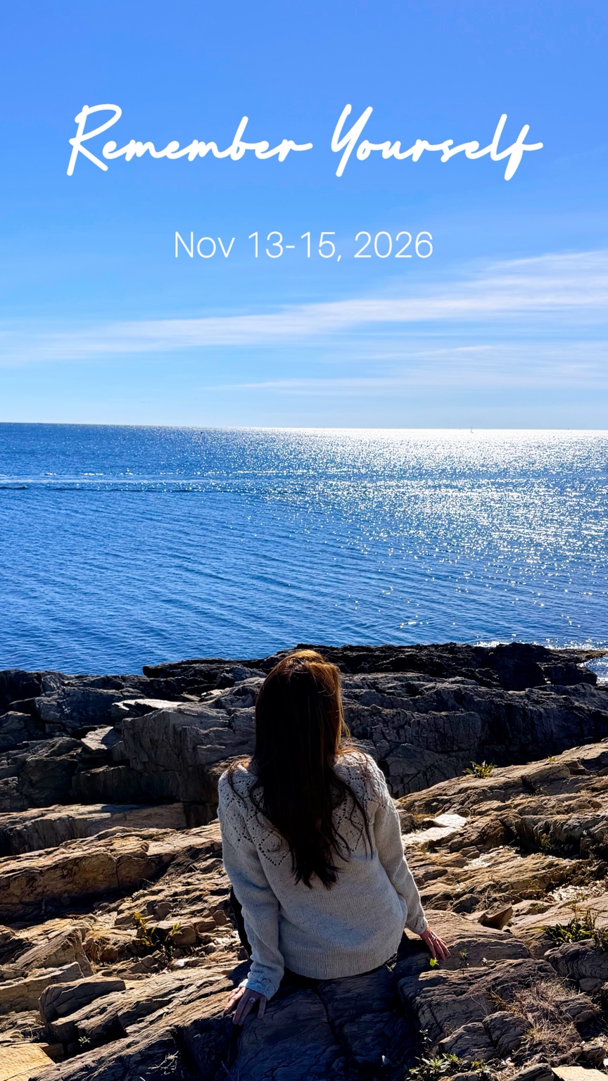 Remember Yourself, November 13–15. Rebekah seated on rocky ledges overlooking the sunlit ocean, with the retreat title and dates.
